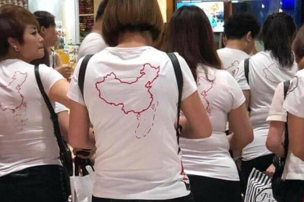 A photo of Chinese tourists wearing T-shirts depicting Beijing’s claims to the disputed South China Sea has sparked online anger in Vietnam. Photo: Twitter