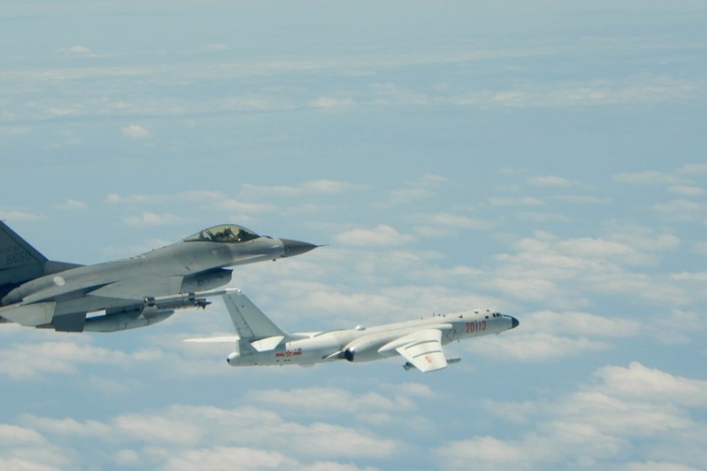 A photograph released by the Taiwan Air Force shows a Taiwanese F-16 jet (left) monitoring a Chinese Air Force H-6 bomber as the mainland Chinese aircraft flew near Taiwan on May 11. Photo: EPA-EFE