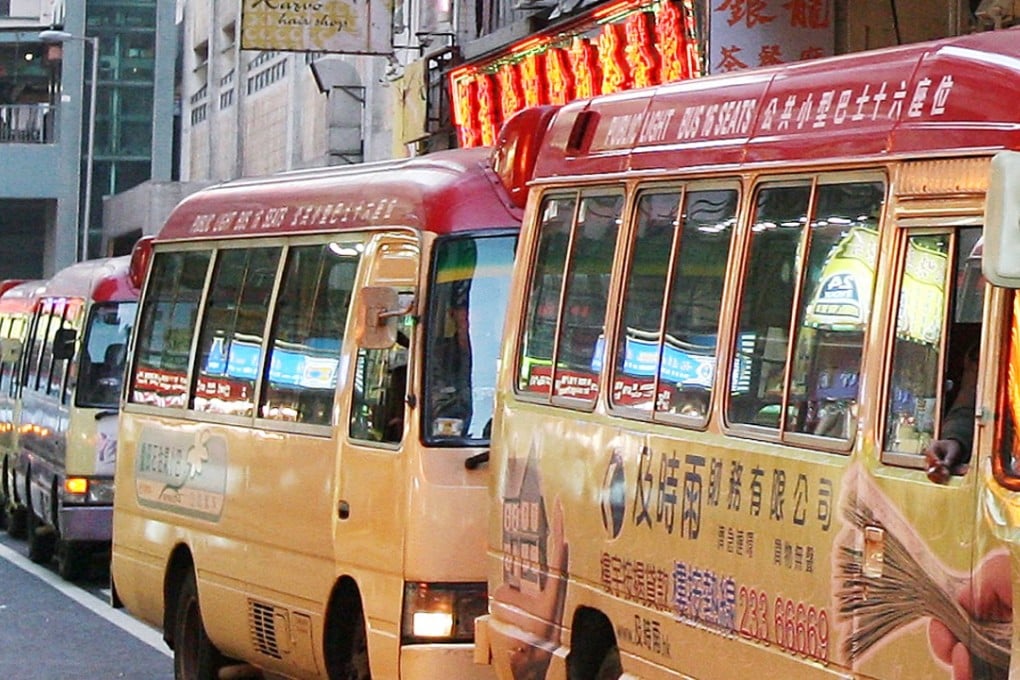 Three red-topped minibus drivers were arrested on Wednesday morning. Photo: Edward Wong