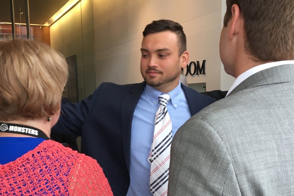Joseph Hudek IV (in the tie) greets supporters who attended his sentencing on Tuesday in Seattle. Photo: TNS