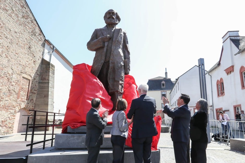 The unveiling of the Karl Marx statue in Trier, Germany, a gift from China on the bicentenary of the philosopher’s birth. Picture: Xinhua