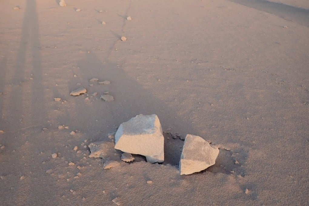 “Ballistic blocks”, smaller rocks and ash shot from the Kilauea volcano hundreds of metres away are seen at the Halema'uma'u car park in Hawaii. Photo: Reuters