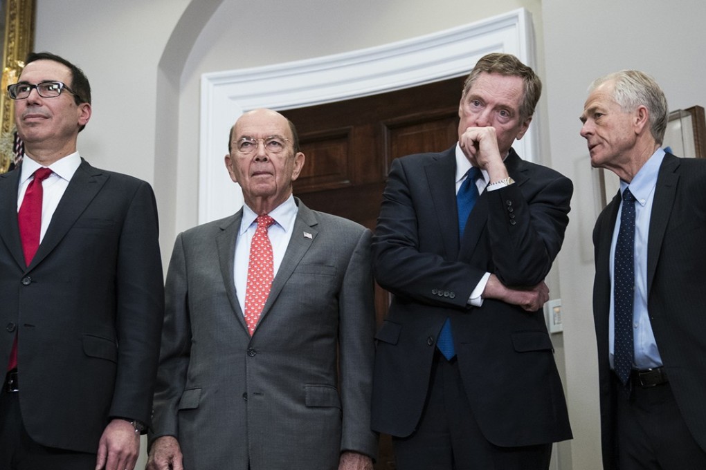 Steven Mnuchin (left) reportedly had an explosive shouting match with Peter Navarro (right). They are pictured with Commerce Secretary Wilbur Ross (second from left) and Trade Representative Robert Lighthizer. Photo: Washington Post