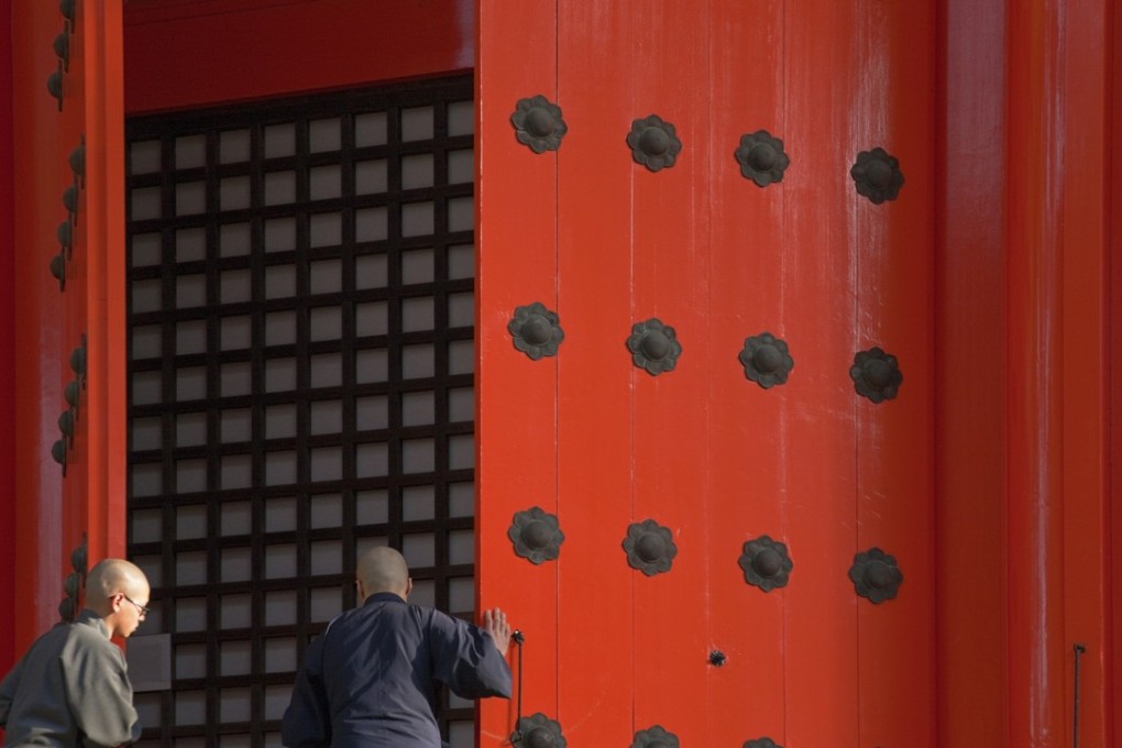 Buddhist monks at the Danjo Garan monastic temple complex atop sacred Koyasan (Mount Koya). File photo: Corbis