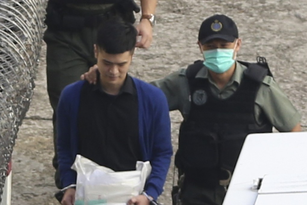 Cheung Sin-hang (left) being escorted from Lai Chi Kok Detention Centre. Photo: Sam Tsang