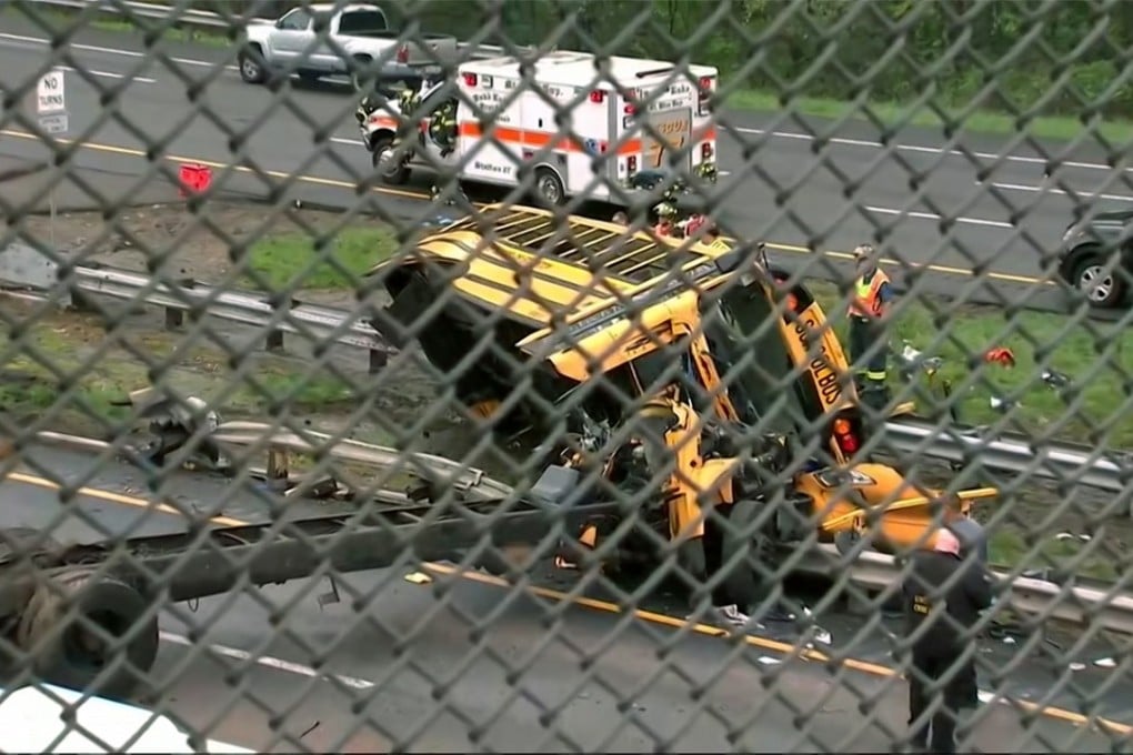 An overturned school bus after it collided with a dump truck on Thursday, killing at least two people and injuring dozens of others, on Interstate 80 in Mount Olive, New Jersey. Photo: WABC-TV via AP