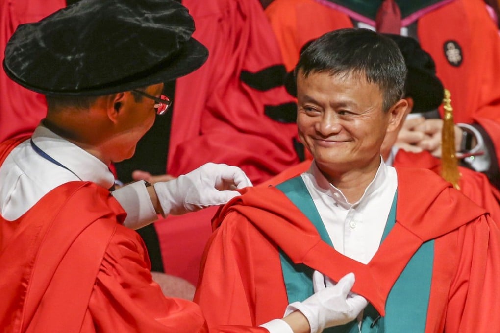 Alibaba founder and executive chairman Jack Ma Yun (right) receiving an honorary doctorate at the University of Hong Kong in Pok Fu Lam. Photo: David Wong