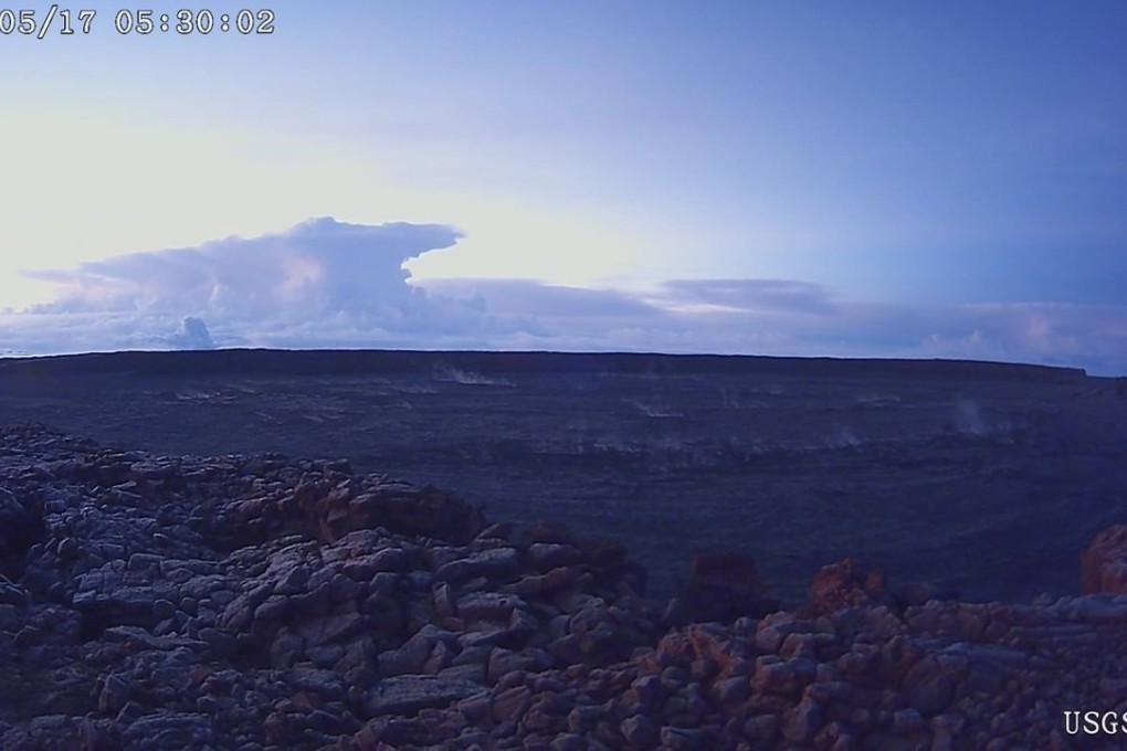 This photo from the US Geological Survey shows the ash plume at the Kilauea Volcano, taken from a Mauna Loa webcam on Thursday in Hawaii. The volcano has erupted from its summit, shooting a dusty plume of ash about 30,000 feet into the sky. Photo: US Geological Survey/HVO via AP