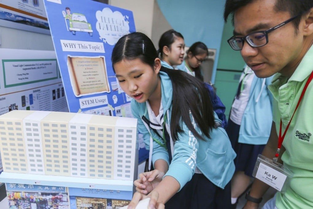 Bethany Ip, 14, explains her team’s parking system project. Photo: Xiaomei Chen