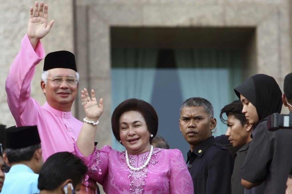 Rosmah Mansor and her husband, Najib Razak. Photo: AP