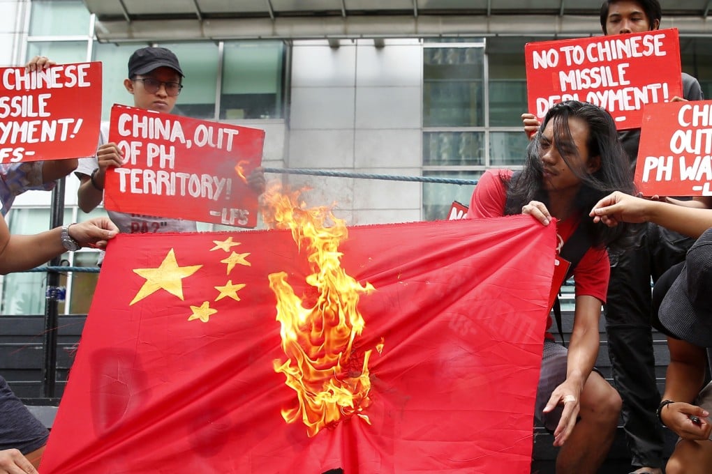 Philippine strongman finds himself between a rock and a hard place as Beijing refuses to let up on militarising areas it claims in the South China Sea