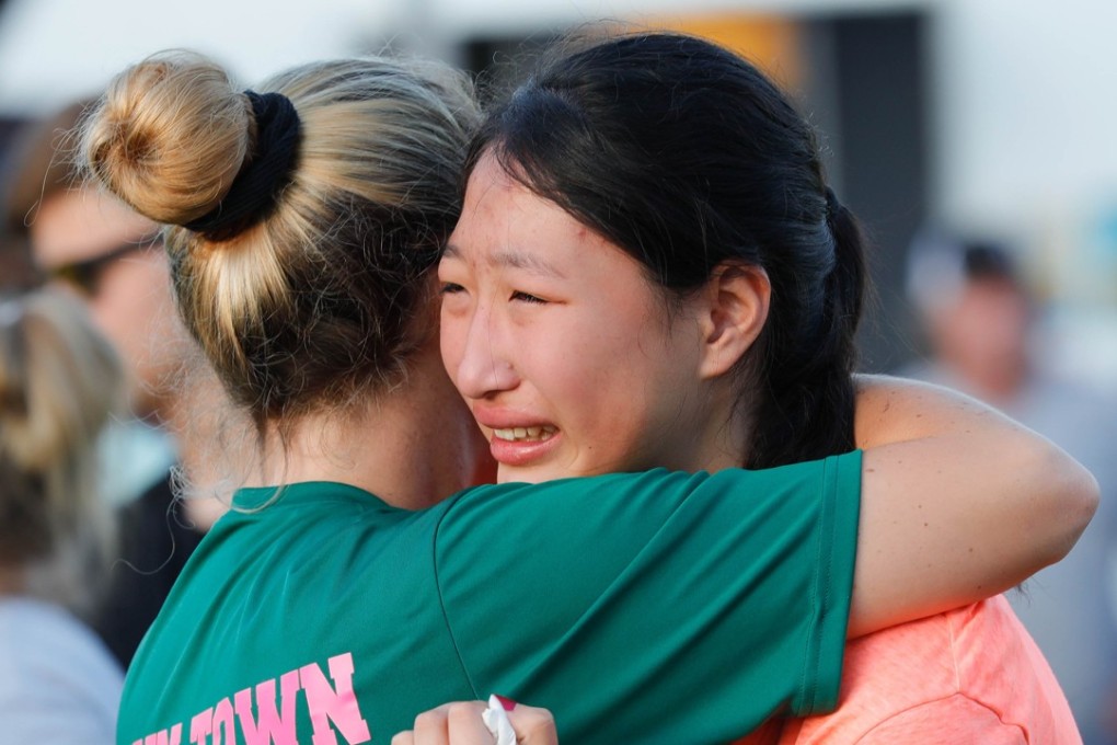 Friends and family attend a vigil for the victims of the shootings at Santa Fe High School. Photo: AFP