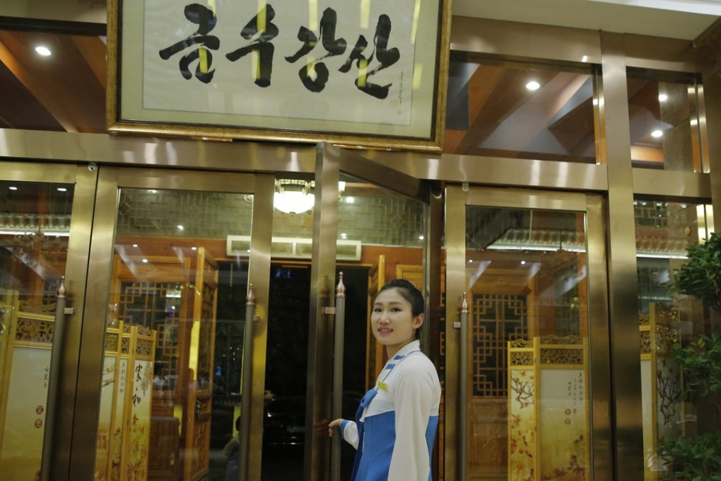 A waitress at a North Korean restaurant in Beijing. North Korea has demanded Seoul return waitresses who ‘defected’ from a restaurant in Ningbo, China in 2016. File photo: EPA