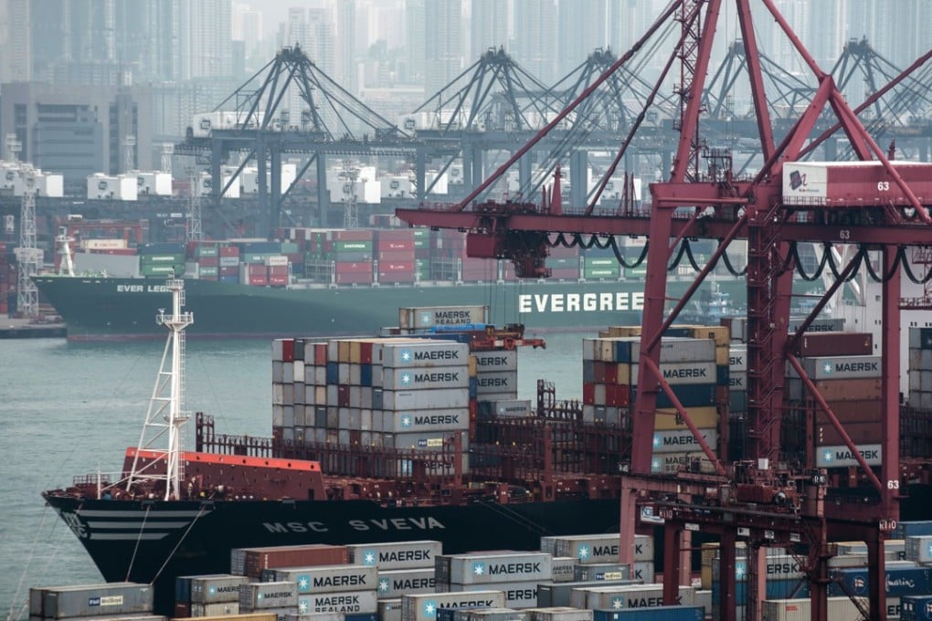Container ships next to shipping containers at Kwai Tsing Container Terminals in Hong Kong. Photo: Bloomberg