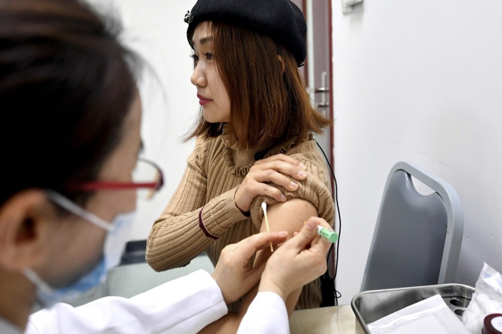 A file picture taken in March of a woman getting a human papilloma virus vaccine against cervical cancer at the Obstetrics and Gynaecology Hospital affiliated to Fudan University in Shanghai. Photo: Imaginechina