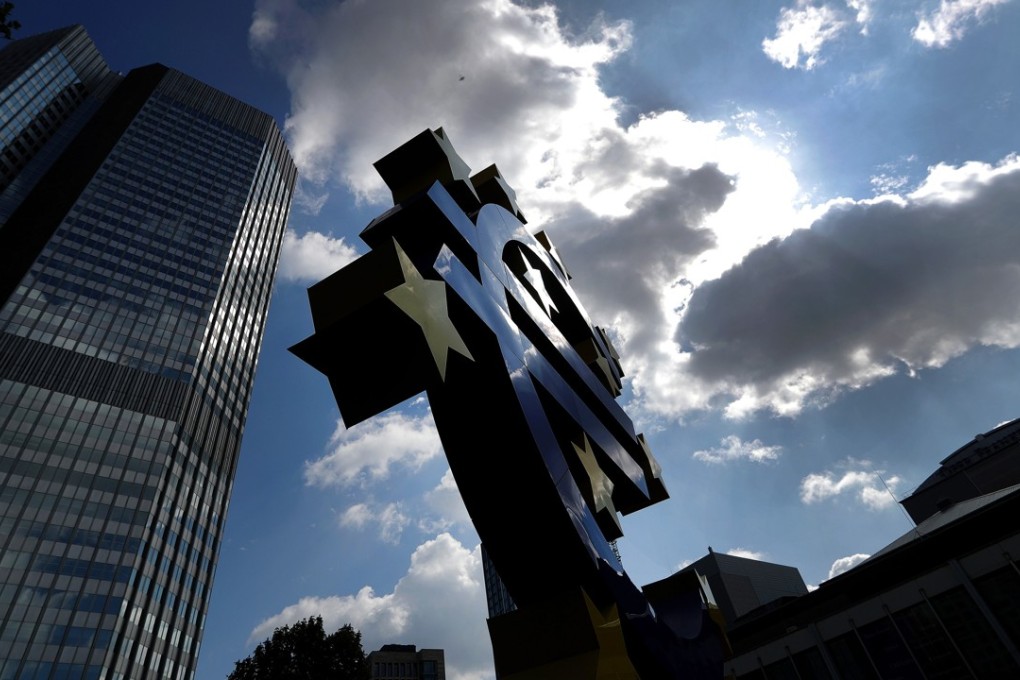 A euro sculpture stands near the former European Central Bank headquarters in Frankfurt, Germany. Photo: Bloomberg