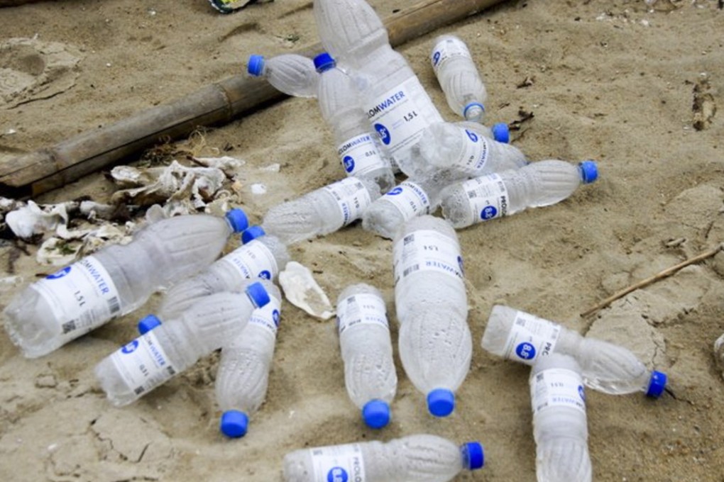 Organisers of an international boot-camp-style obstacle race in Hong Kong came under fire after plastic bottles and cordage from the race were found strewn on the beach at the ecologically sensitive Ha Pak Nai in Yuen Long, on April 14. Photo: Handout