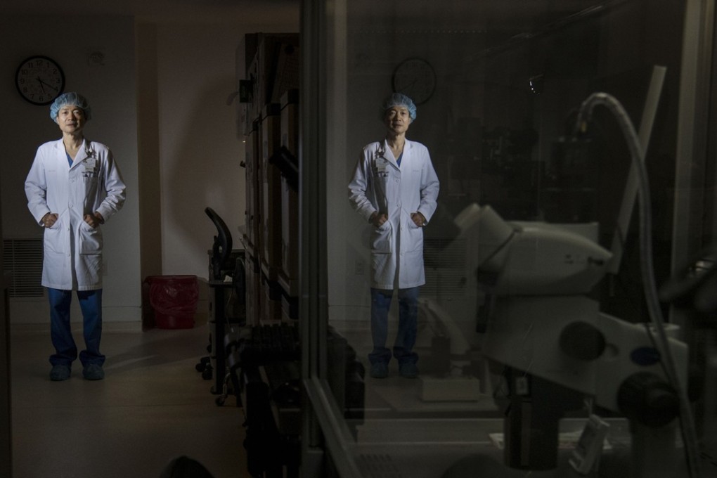 Fertility specialist Doctor John Zhang, shown in the lab at his New Hope Fertility Center in New York. Picture: Carolyn Van Houten/The Washington Post
