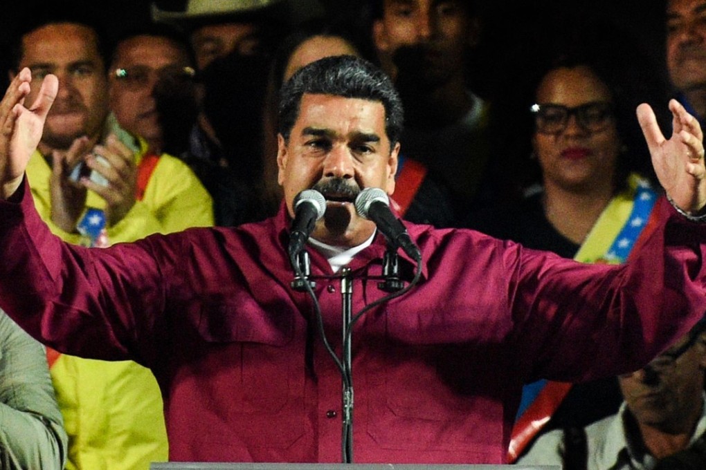 Venezuelan President Nicolas Maduro addresses supporters after the election result is released. Photo: AFP