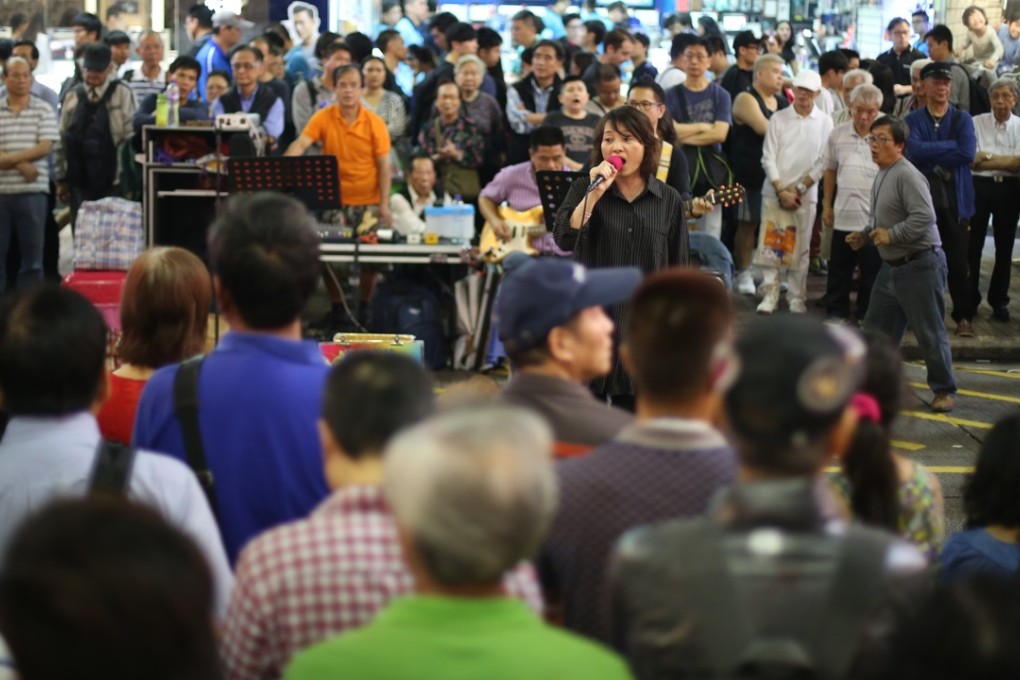 The pedestrian zone in Mong Kok attracts a variety of street acts, many of which are loud. Photo: Sam Tsang