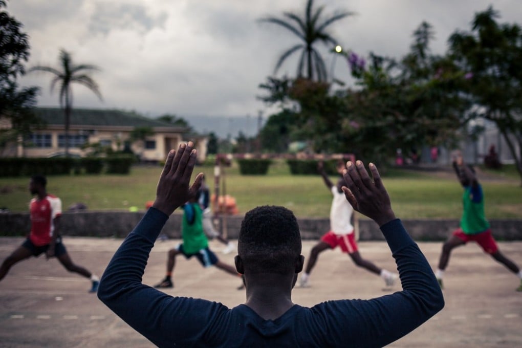 Students at the English-language University of Buea students train in the southwest Region of Cameroon, where several small armed groups are demanding independence for English-speaking regions of Cameroon, bordering Nigeria. Photo: Agence France-Presse