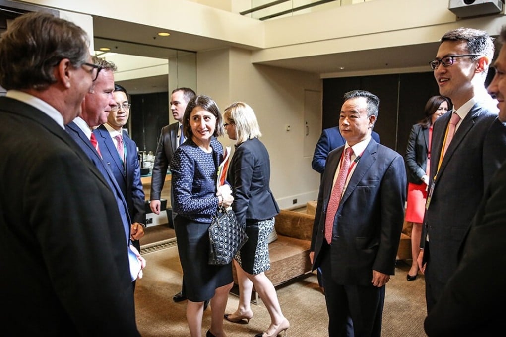 Chau Chak-wing (centre right) at an event to mark Chinese Premier Li Keqiang's visit to Australia in March 2017. Photo: Kingold