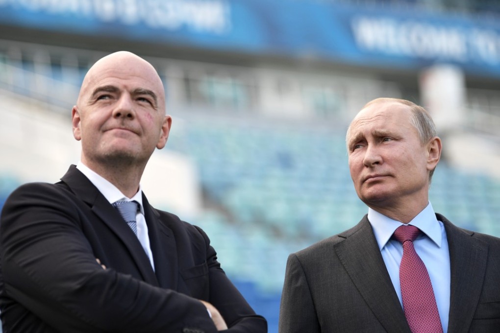 Fifa president Gianni Infantino (left) and Russian President Vladimir Putin inspect the renovated Fisht Stadium, in Sochi, which will host some matches of the upcoming 2018 Fifa World Cup in Russia, on May 3. Infantino has spoken of grandiose plans for world football, including a new world cup for clubs rather than countries. Photo: EPA-EFE