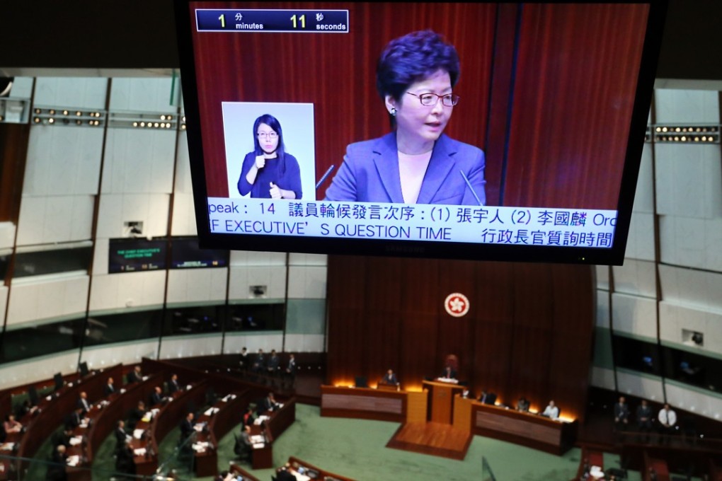 Lam answers a question in Legco on Wednesday. Photo: Dickson Lee