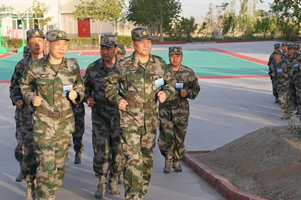 Senior commanders pictured during a morning run. Photo: Xinhua