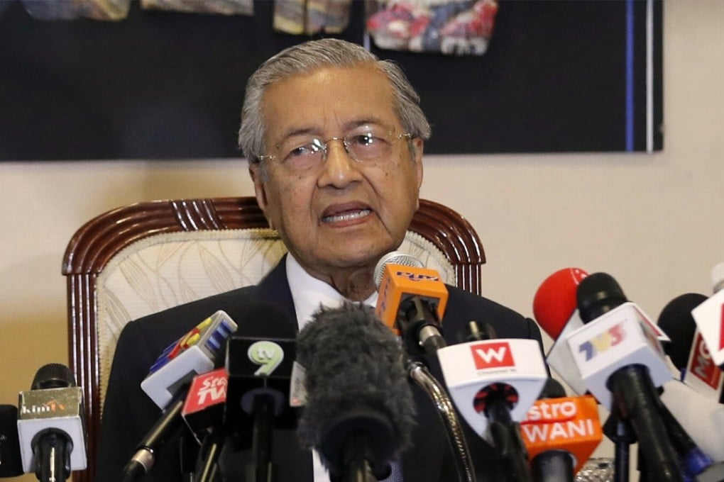 Malaysian Prime Minister Mahathir Mohamad speaks during a press conference in Putrajaya. Mahathir has unveiled a mix of senior politicians, lawyers and a lecturer in his new cabinet after a stunning electoral victory last week. Photo: AP