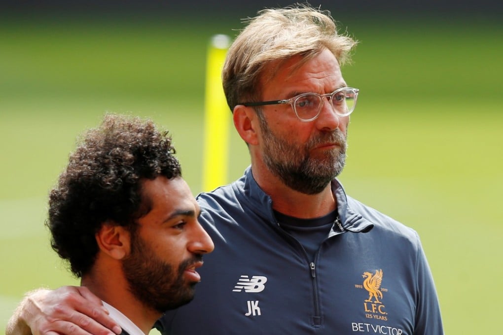Liverpool manager Jurgen Klopp talks with Mohamed Salah during training ahead of the Champions League final. Photo: Reuters