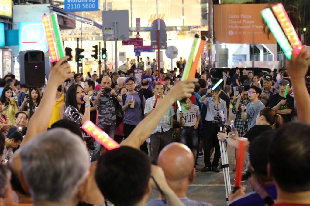 Street performers in the Mong Kok pedestrian zone. Photo: Felix Wong