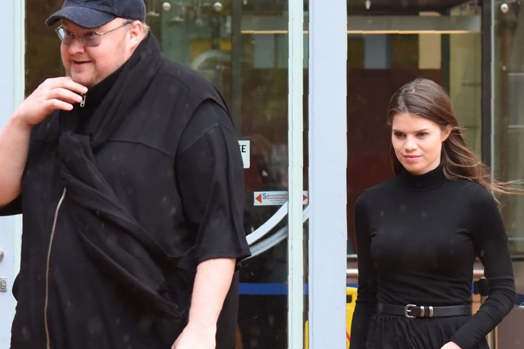 Internet mogul Kim Dotcom with his wife Liz Dotcom. Photo: AFP PHOTO/KATE DWEK