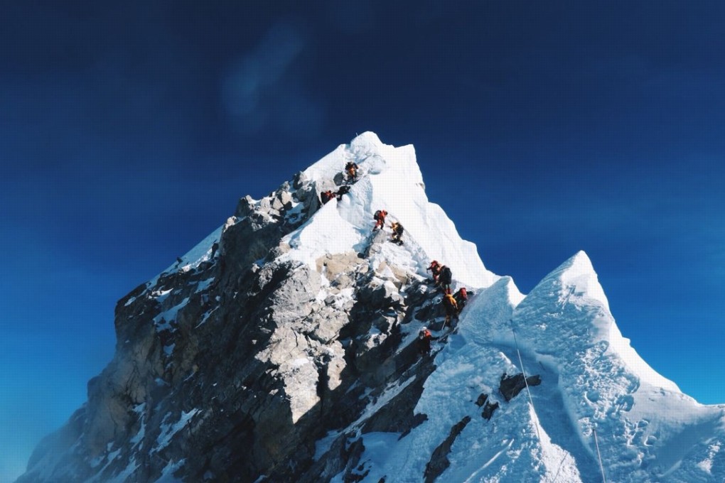 Benjamin Chan and the other climbers in the group make their way to the world’s highest peak. Photo: Benjamin Chan