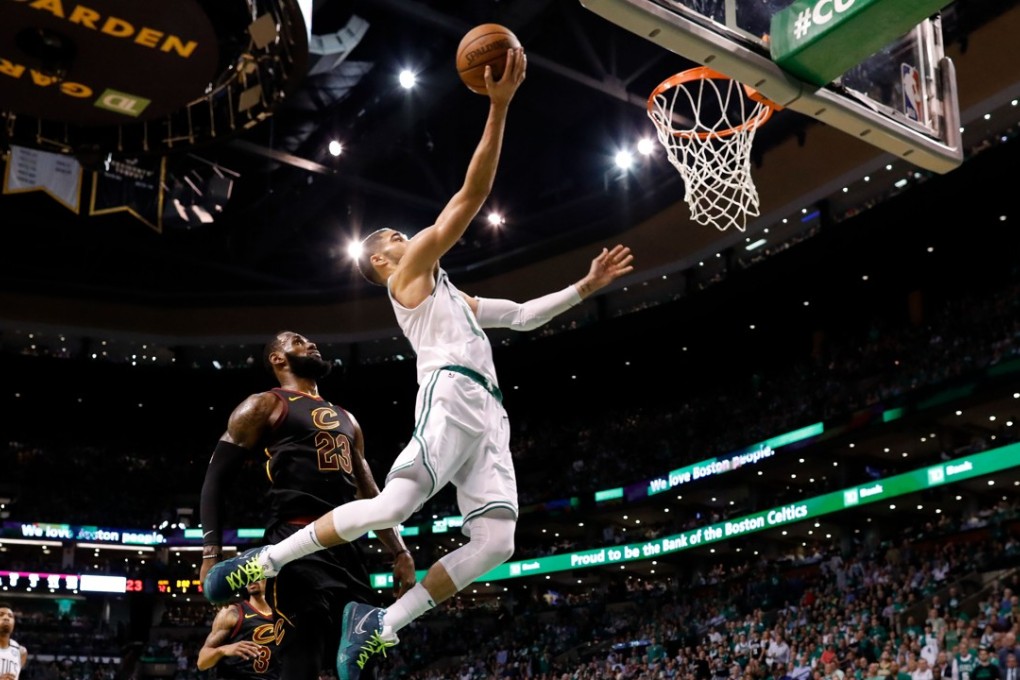 Boston Celtics forward Jayson Tatum attempts a lay-up in front of Cleveland Cavaliers’ LeBron James. Photo: USA Today