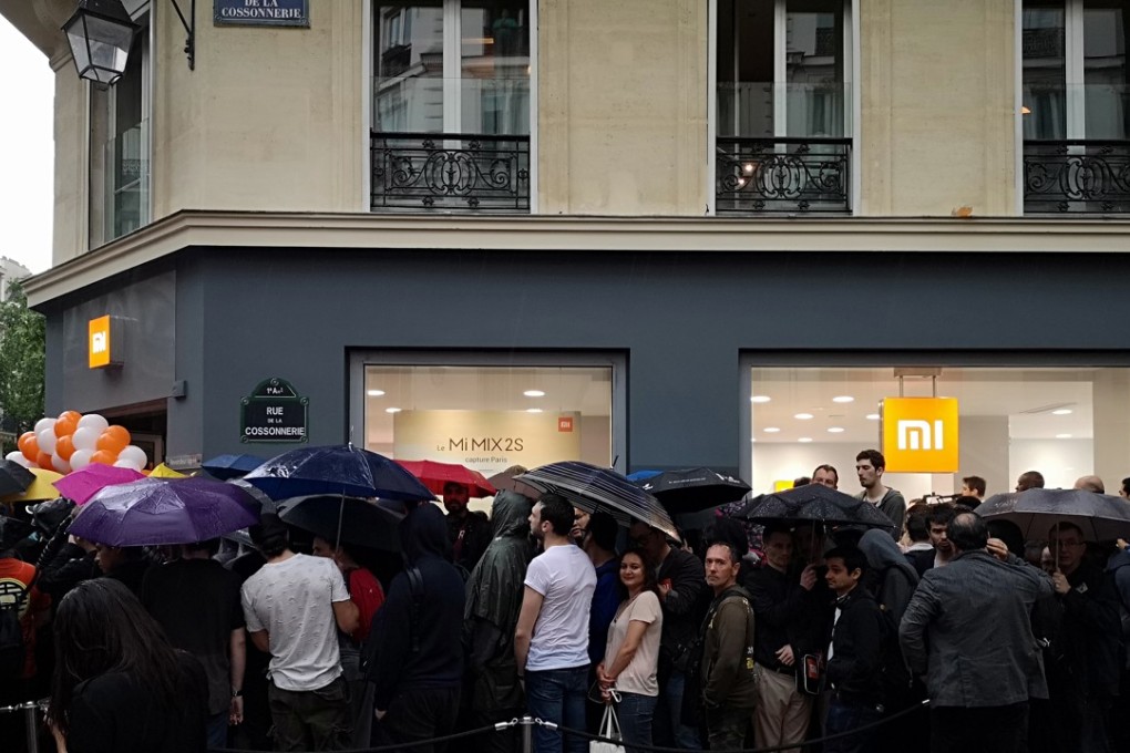 Customers outside Xiaomi’s newly opened Mi Store along the Boulevard de Sebastopol in Paris on May 22, 2018. Photo: Xinhua