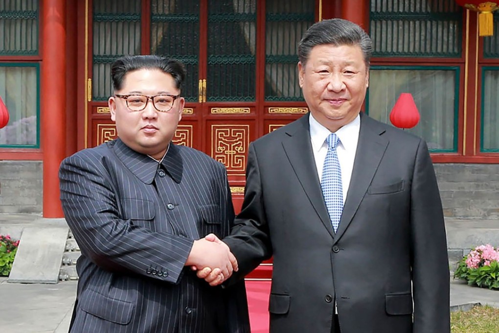 North Korea’s leader, Kim Jong-un, shakes hands with Chinese President Xi Jinping in March. A high-ranking North Korean official was reportedly in Beijing on Thursday after US President Donald Trump scrapped his planned summit with Kim. Photo: AFP/KCNA via KNS