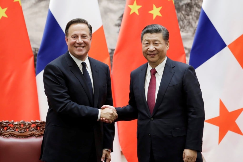 Panama President Juan Carlos Varela (left) shakes hands with Chinese President Xi Jinping during his visit to Beijing in November. Photo: Reuters