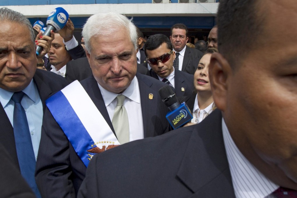 Panama's former president Ricardo Martinelli leaving Congress after delivering his last State of the Nation address. The ex-leader is dropping his legal efforts to fight extradition from the United States to Panama. Photo: AP