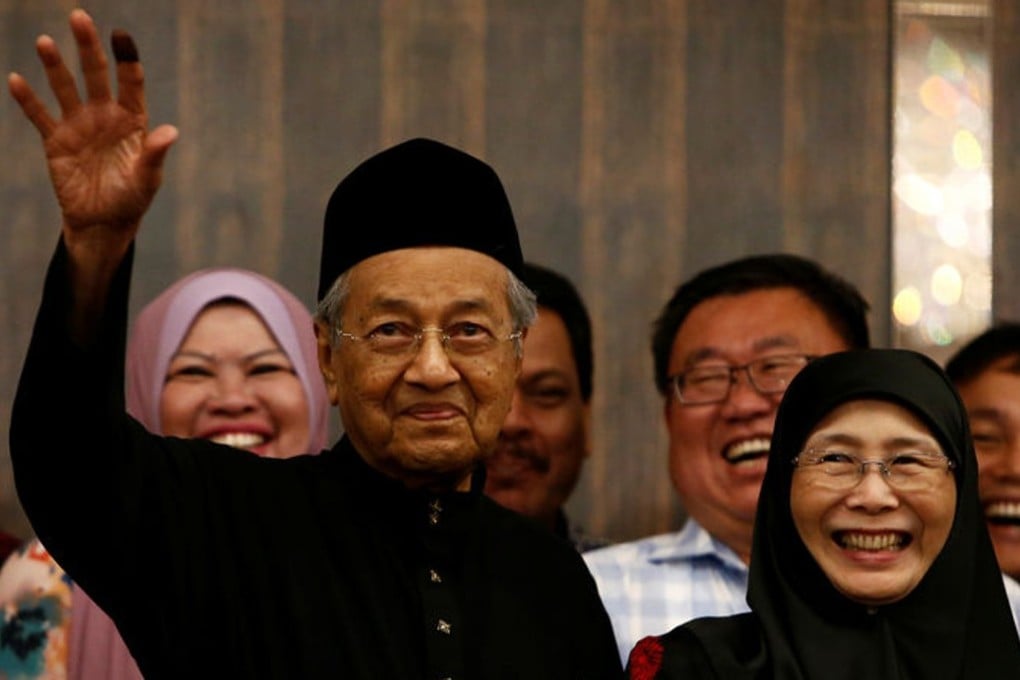 Malaysian Prime Minister Mahathir Mohamad with Wan Azizah, the wife of Anwar Ibrahim. Photo: Reuters