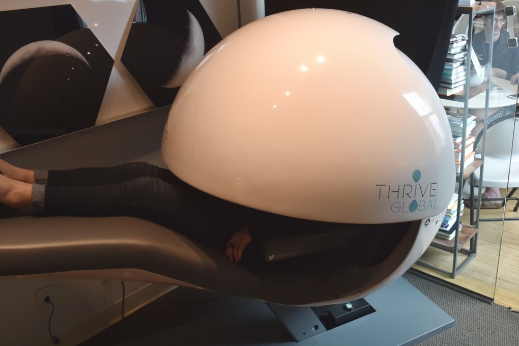Recharging the New York way in an “energy pod" at wellness company Thrive Global. A nap takes the same amount of time as a coffee break or cigarette break, says the founder of the company behind the MetroNaps sleep capsule. Photo: AFP