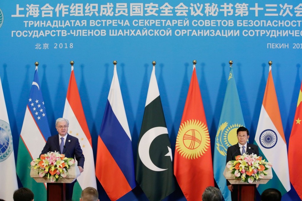 China’s Minister of Public Security Zhao Kezhi (right) and Shanghai Cooperation Organisation Secretary-General Rashid Alimo attend a news conference after a meeting of the SCO security secretary summit in Beijing on May 22. Photo: AFP