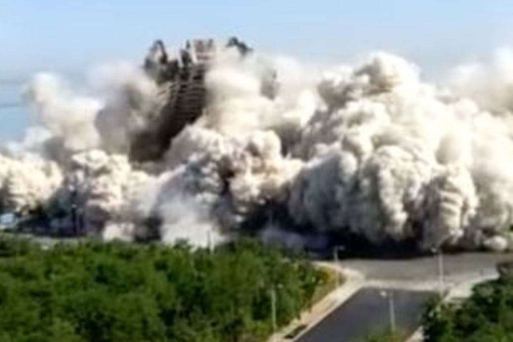 The blocks of flats have been demolished, possibly to make way for a hotel. Photo: news.163.com