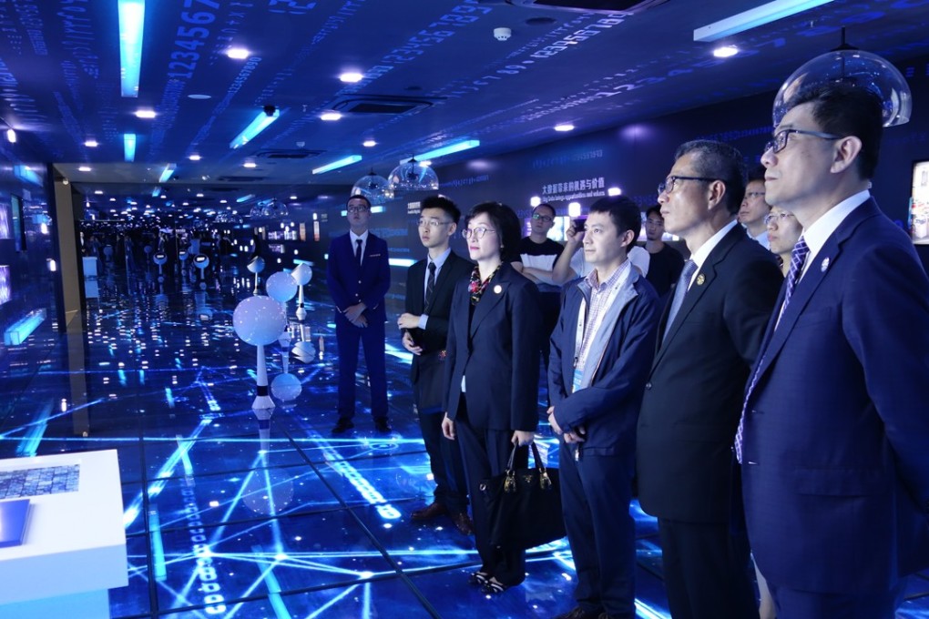 Chan (second right) attended the China International Big Data Industry Expo in Guiyang and visited the demonstration centre of the Guizhou big data pilot zone to learn more about Guizhou's development goals. Photo: Handout