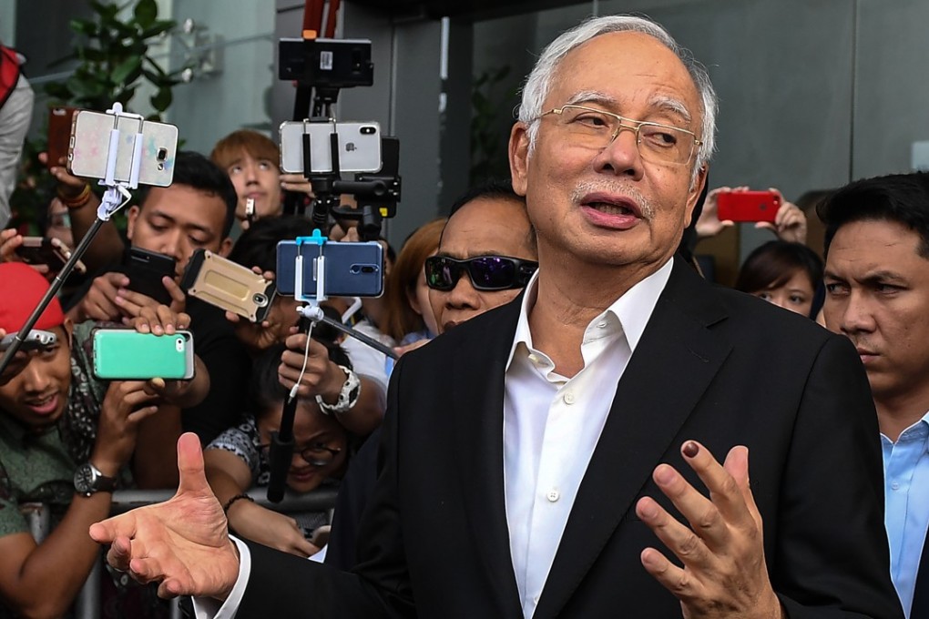 Malaysia's former prime minister Najib Razak after being questioned by the Malaysian Anti-Corruption Commission. Photo: AFP