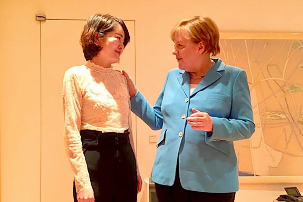 German Chancellor Angela Merkel (right) offered her support to Li Wenzu, the wife of detained human rights lawyer Wang Quanzhang, during her visit to China last week. Photo: Facebook