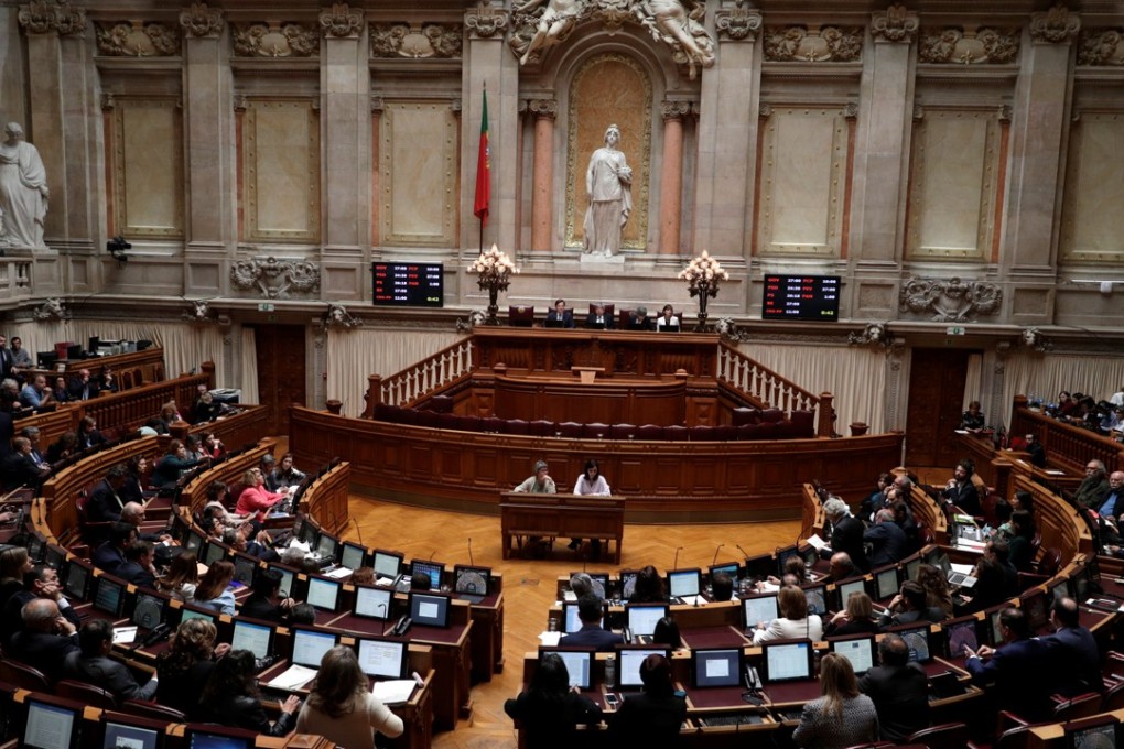 Portugal’s parliamentary members attend a vote on legalising euthanasia in Lisbon, Portugal on Tuesday. Photo: Reuters