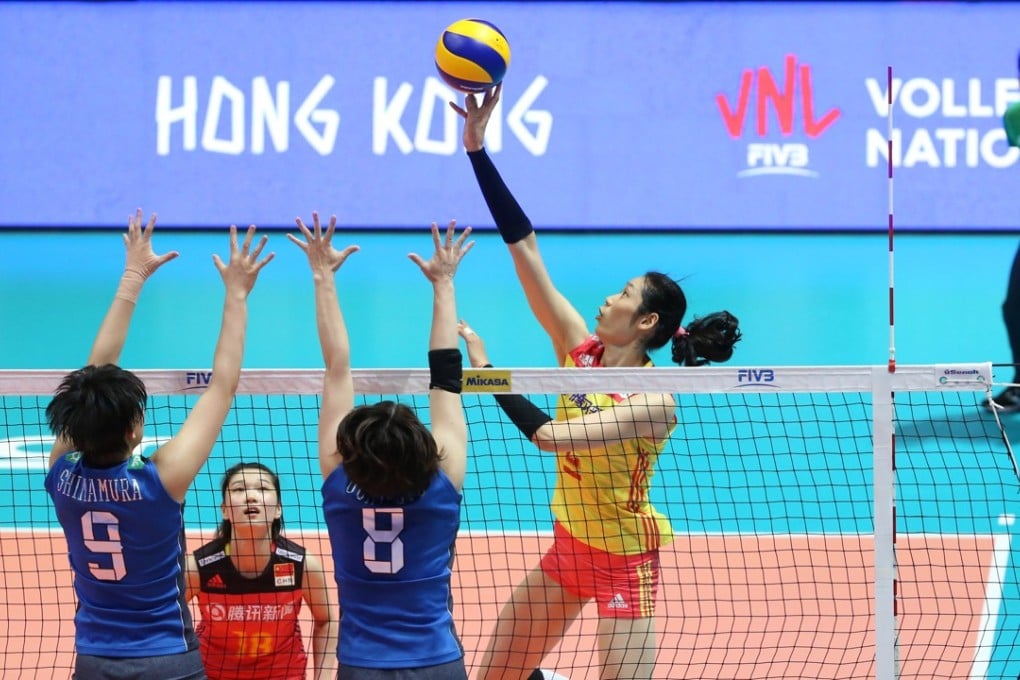 China captain Zhu Ting tries to score past the Japanese defence during the FIVB Volleyball Nations League at the Coliseum. Photos: Felix Wong