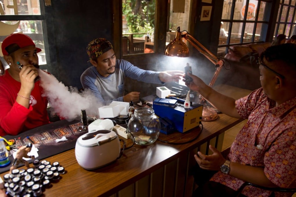 A vaping cafe in Jakarta, the capital of chain-smoking Indonesia, which has faced criticism over its decision to impose a 57 per cent excise tax on e-cigarettes from July 1. Critics say the government is siding with giant tobacco firms at the expense of public health. Photo: AFP