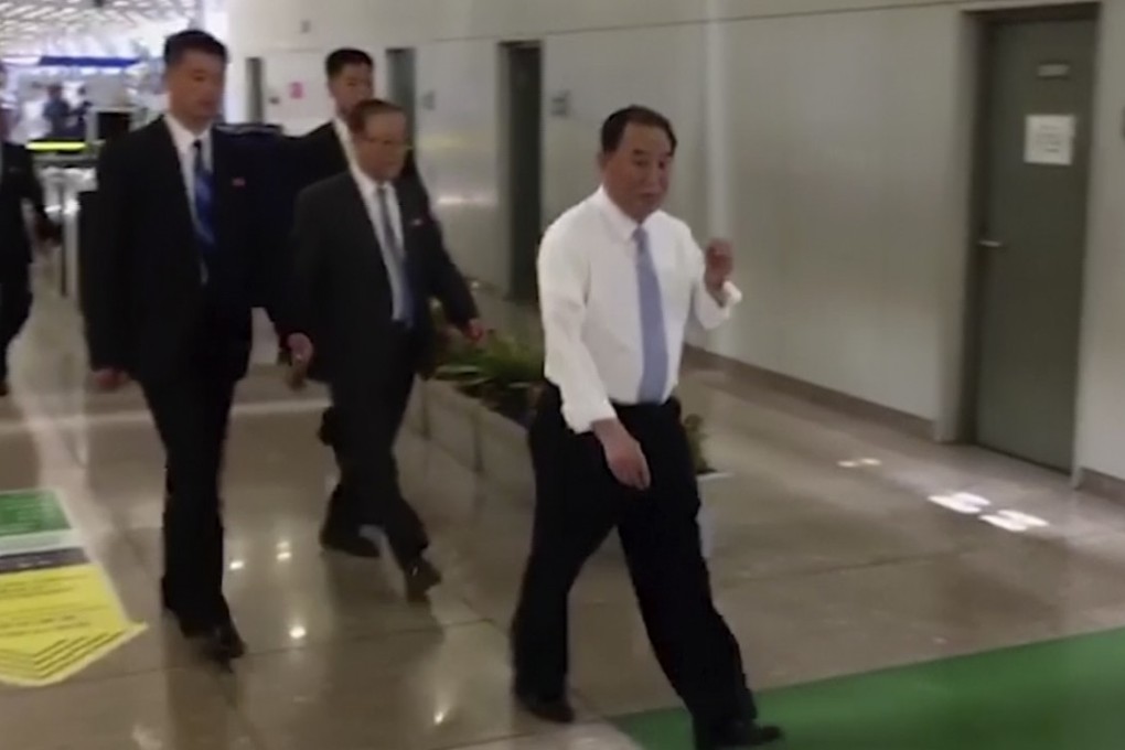 Kim Yong-chol, in white, at Beijing’s airport before heading to the United States. Photo: AP